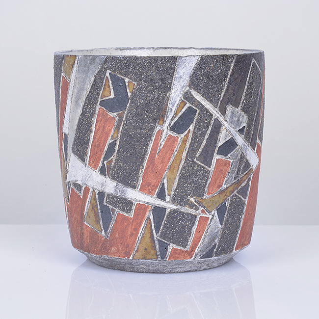 A red, brown, grey, white and ochre stoneware guinomi made by Wada Morihiro sold at auction by Maak Contemporary Ceramics