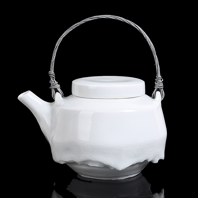 A pale blue celadon porcelain teapot made by Edmund de Waal in circa 1995 sold at auction by Maak Contemporary Ceramics
