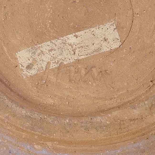 An incised HM mark on a stoneware bottle vase made by Heber Matthews in circa 1945 sold at auction by Maak Contemporary Ceramics