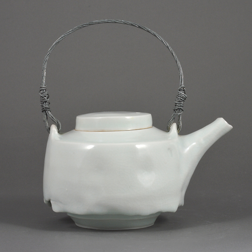 A pale blue celadon porcelain teapot made by Edmund de Waal in 1995 sold at auction by Maak Contemporary Ceramics
