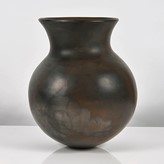 A black earthenware vessel made by Magdalene Odundo in 1982 sold at auction by Maak Contemporary Ceramics