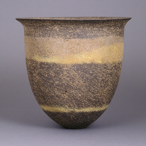 A brown and green stoneware bowl made by Jennifer Lee in 1989 sold at auction by Maak Contemporary Ceramics