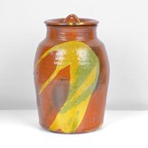 An amber and yellow stoneware lidded jar made by Betty Woodman sold at auction by Maak Contemporary Ceramics