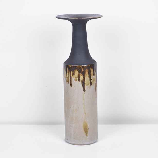 A cream and manganese stoneware bottle vase made by Eileen Lewenstein sold at auction by Maak Contemporary Ceramics