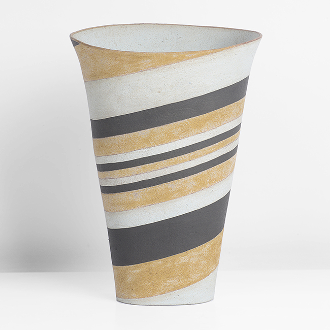 A pale blue, ochre and black stoneware flared vessel made by Elizabeth Fritsch in 1980 sold at auction by Maak Contemporary Ceramics