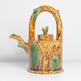 A yellow, brown and green earthenware teapot made by Walter Keeler in 1999 sold at auction by Maak Contemporary Ceramics