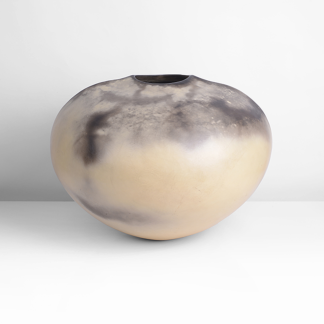 A cream and grey smoke fired and burnished earthenware vessel made by Gabriele Koch in circa 1982 sold at auction by Maak Contemporary Ceramics