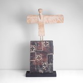 A cream, red and black stoneware figurative group 'Angel and Wall' made by John Maltby in 2007 sold at auction by Maak Contemporary Ceramics