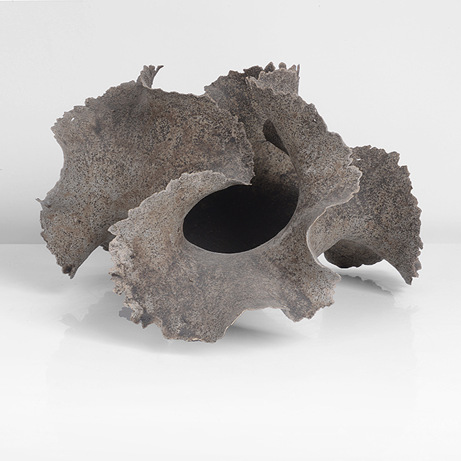 A brown stoneware ruffle form made by Ursula Morley-Price in 1982 sold at auction by Maak Contemporary Ceramics