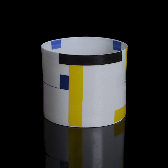 A white, blue, black and yellow porcelain vessel, 'Construction in Blue, Yellow & Black' made by Bodil Manz in 2013 sold at auction by Maak Contemporary Ceramics