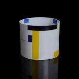 A white, blue, black and yellow porcelain vessel, 'Construction in Blue, Yellow & Black' made by Bodil Manz in 2013 sold at auction by Maak Contemporary Ceramics