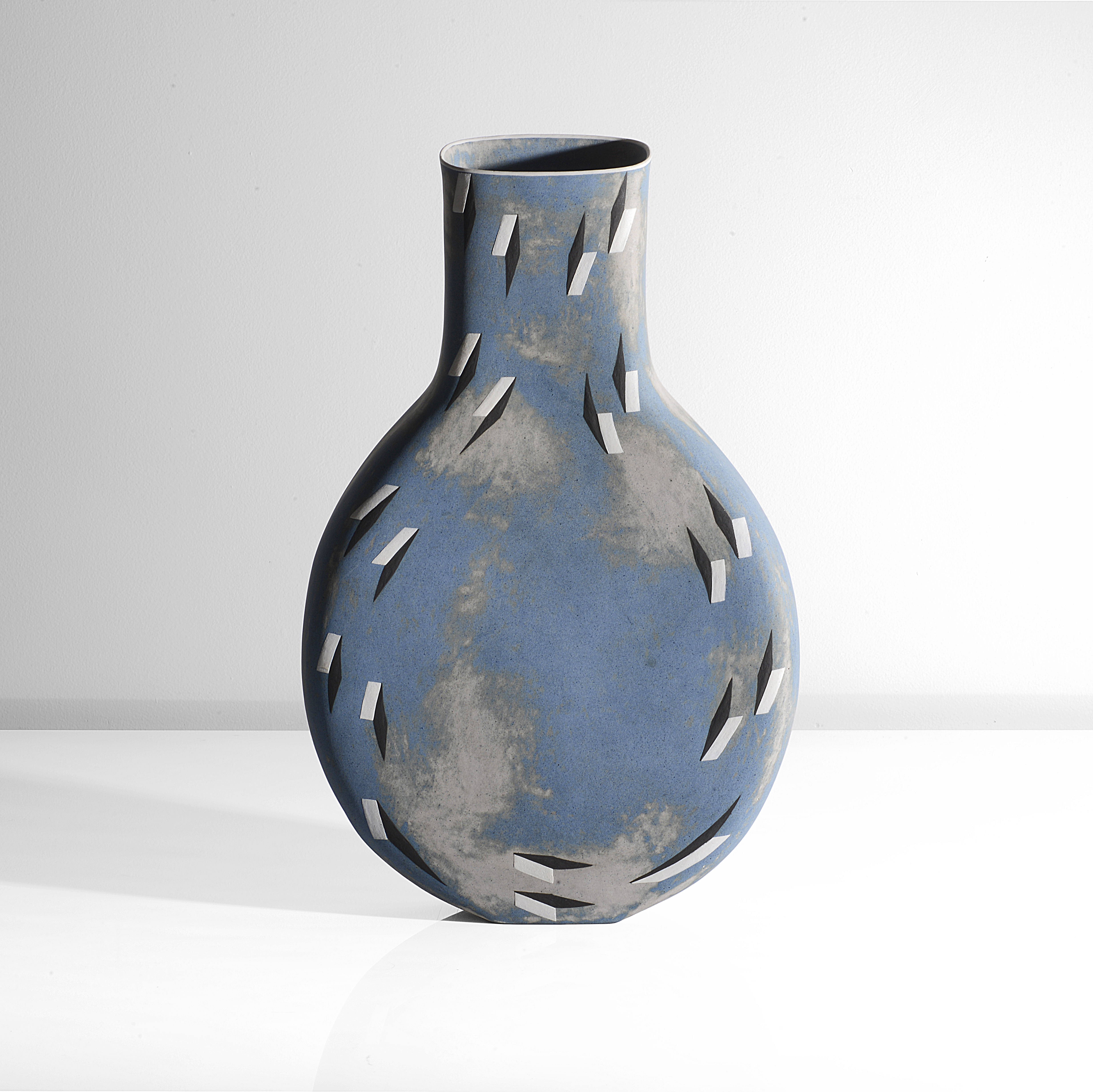 A stoneware vase with coloured slips made by Elizabeth Fritsch in 2012