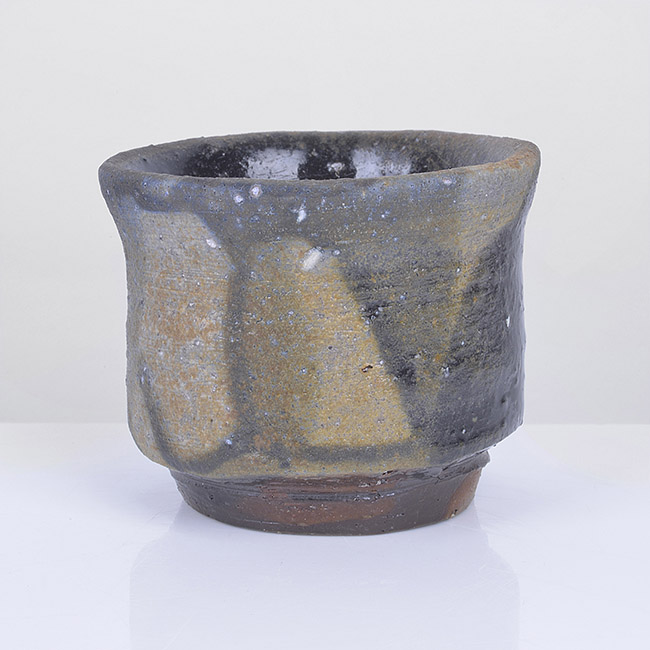 A stoneware black bizen guinomi made by Isezaki Jun sold at auction by Maak