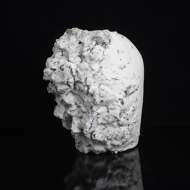 A white stoneware sculptural form made by Aneta Regel sold at auction by Maak Contemporary Ceramics