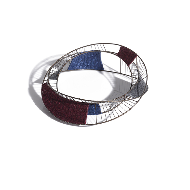 A steel and cotton bangle bracelet made by David Poston in circa 2010