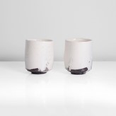 A pair of stoneware kohiki yunomi made by Tsujimura Shiro sold at auction by Maak