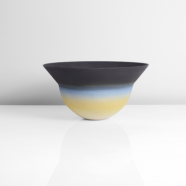 A black, blue and yellow porcelain bowl made by Peter Lane sold at auction by Maak Contemporary Ceramics
