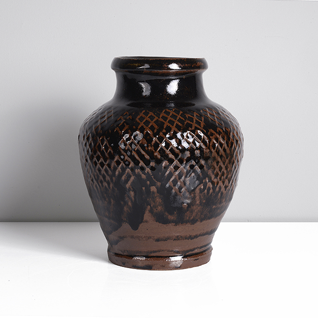 A tenmoku and iron stoneware vase made by Kimura Ichiro sold at Maak