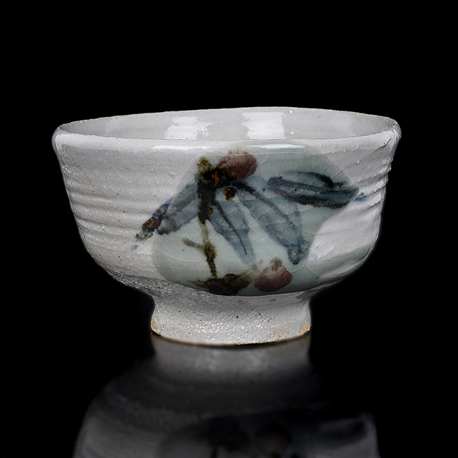 A white, blue and iron painted stoneware chawan or tea bowl made by Tamura Koichi sold at auction by Maak