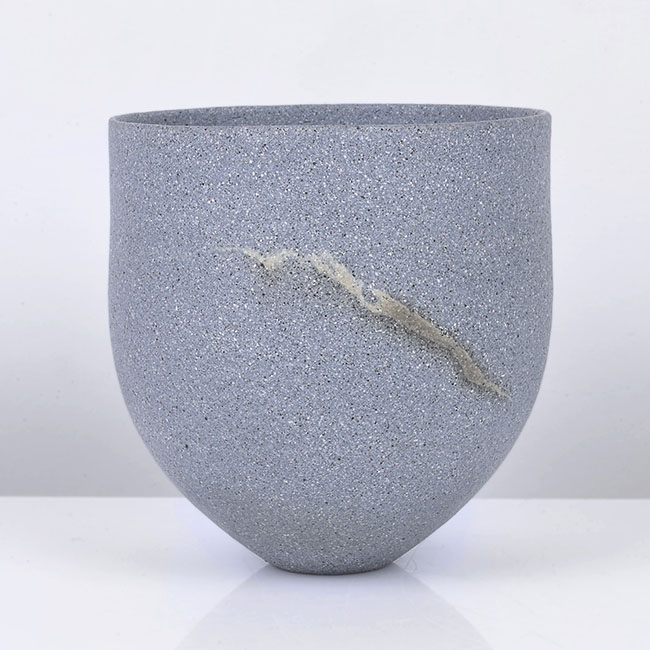 A blue grey stoneware pot, 'Slate-Blue, Olive Haloed Trace', made by Jennifer Lee in 1998 sold at auction by Maak Contemporary Ceramics