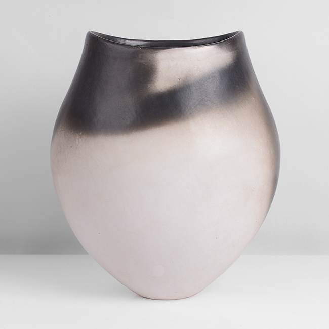 A black and white burnished and smoke fired earthenware vessel made by Gabriele Koch sold at auction by Maak Contemporary Ceramics