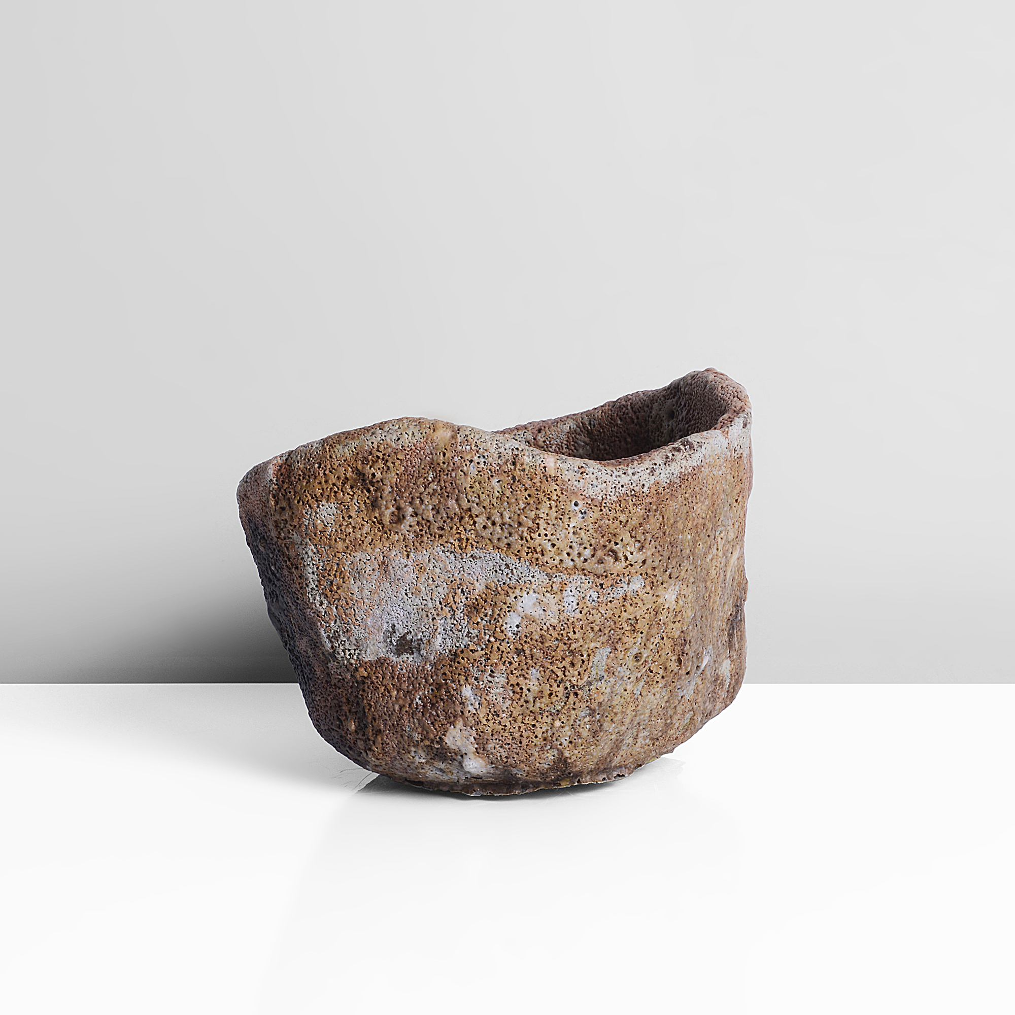 A mixed laminated clay tea bowl made by Ewen Henderson