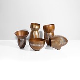 Five copper and white metal asymmetric vessels made by Pete Stevens in 2000