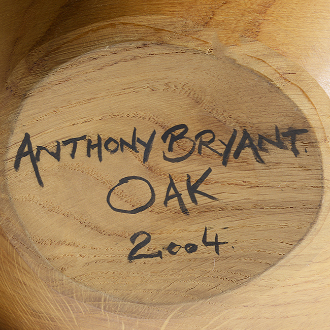 Painted signature and date on an oak vessel by Anthony Bryant