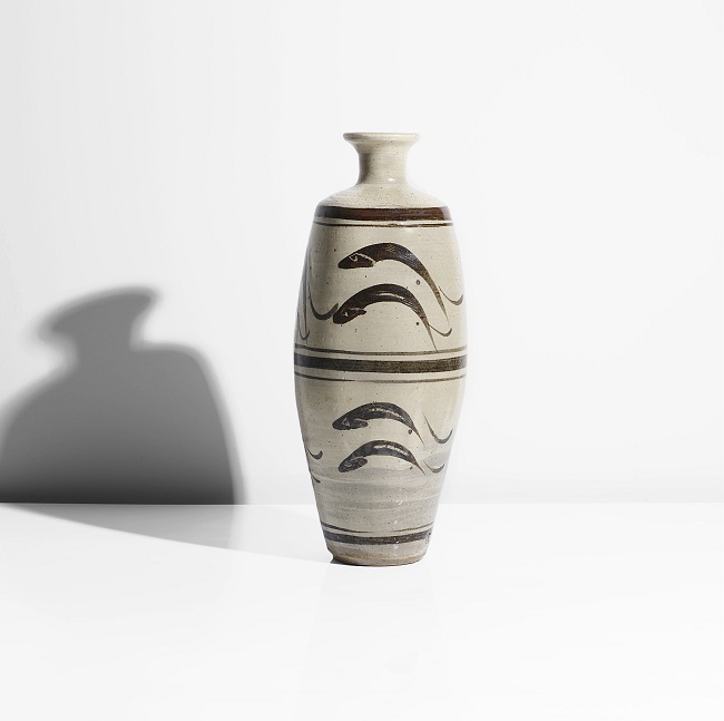 A cream stoneware 'Leaping Salmon' vase made by Bernard Leach in circa 1960 sold at auction by Maak Contemporary Ceramics
