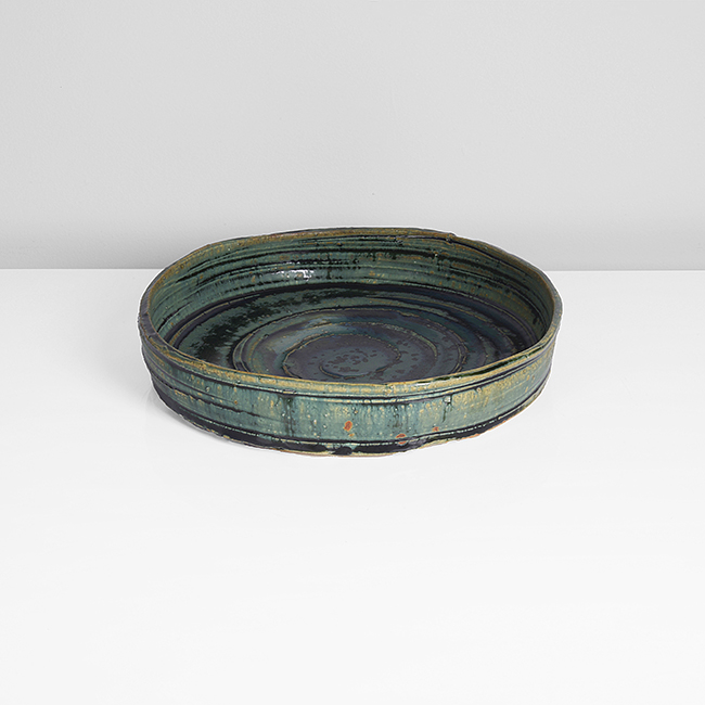 A green oribe stoneware bowl made by Yamada Kazu sold at auction by Maak