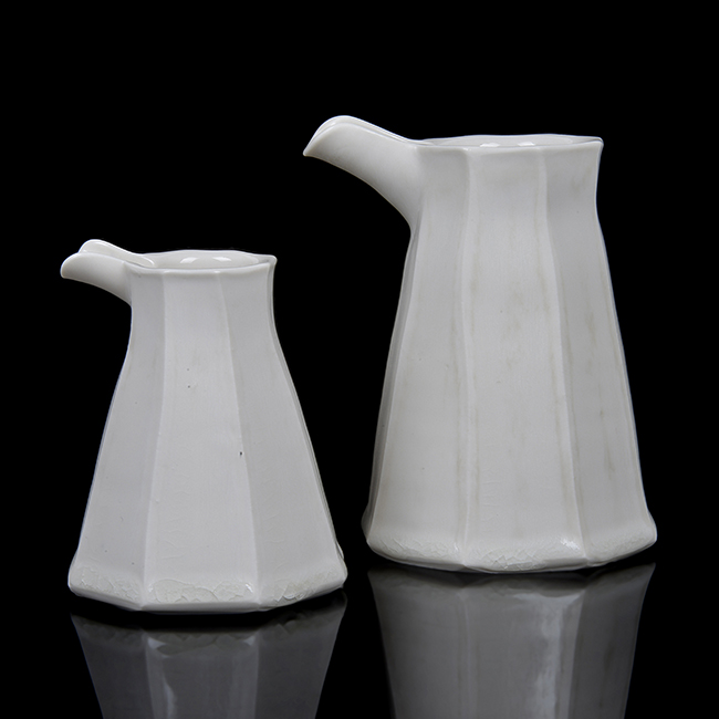 Two porcelain jugs made by Julian Stair in circa 1995 sold at auction by Maak Contemporary Ceramics