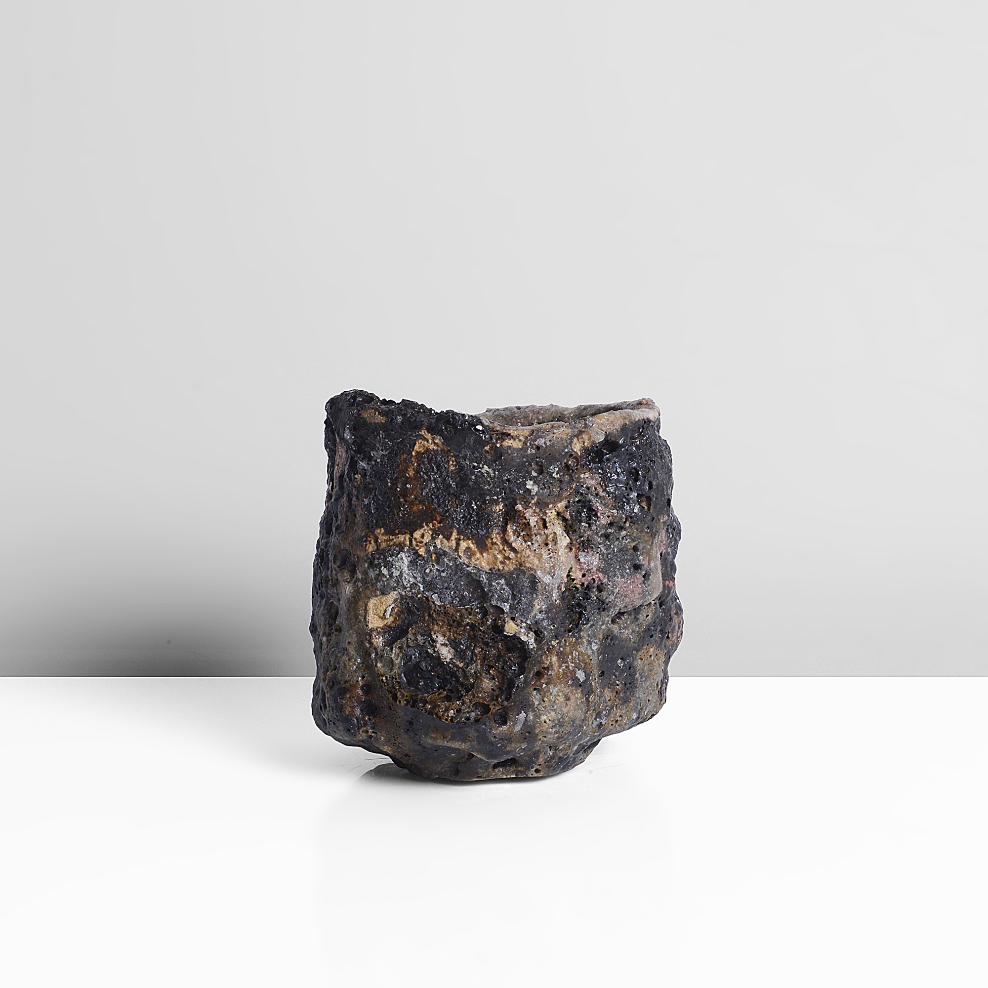 A mixed laminated clay tea bowl made by Ewen Henderson