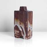 A red and white shino glaze stoneware bottle vase made by Japanese artist Matsuzaki Ken sold at auction by Maak