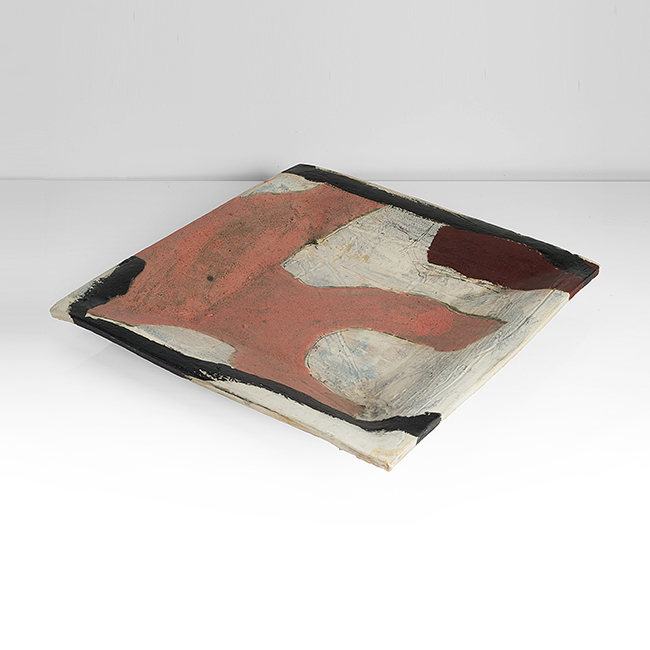 A red, black and white earthenware charger made by Ken Eastman in 1987 sold at auction by Maak Contemporary Ceramics