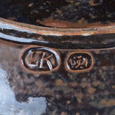 Impressed LK and Abuja Pottery seals on a dish made by Ladi Kwali