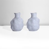 A pair of porcelain sake jugs made by Ikuko Iwamoto