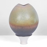 A purple, green and orange porcelain pod form made by Geoffrey Swindell in 1978 sold at auction by Maak Contemporary Ceramics