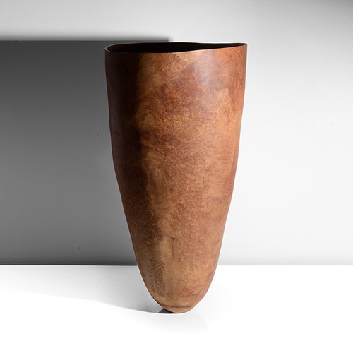 A tall wood vessel made by Anthony Bryant in 2004