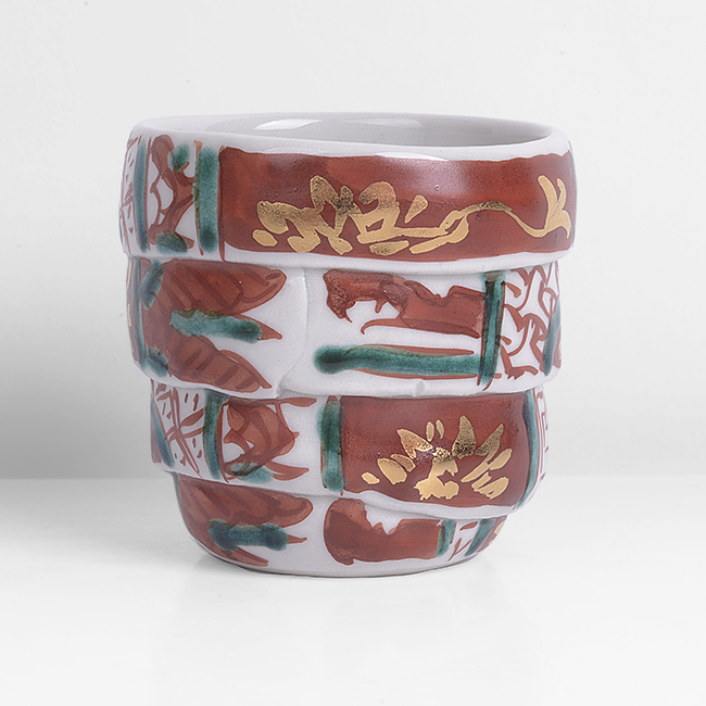 A porcelain guinomi with overglaze red and green enamels made by Matsuda Yuriko sold at auction by Maak