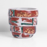 A porcelain guinomi with overglaze red and green enamels made by Matsuda Yuriko sold at auction by Maak