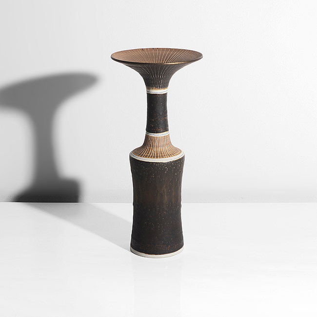 A manganese and terracotta porcelain vase made by Lucie Rie in circa 1978 sold at auction by Maak Contemporary Ceramics
