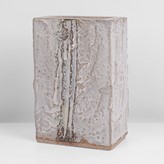 A white stoneware textured vessel made by Ian Auld in circa 1975 sold at auction by Maak Contemporary Ceramics