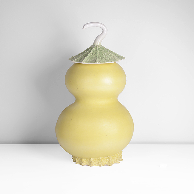 A yellow earthenware lidded jar made by Richard Slee in circa 1988 sold at auction by Maak Contemporary Ceramics