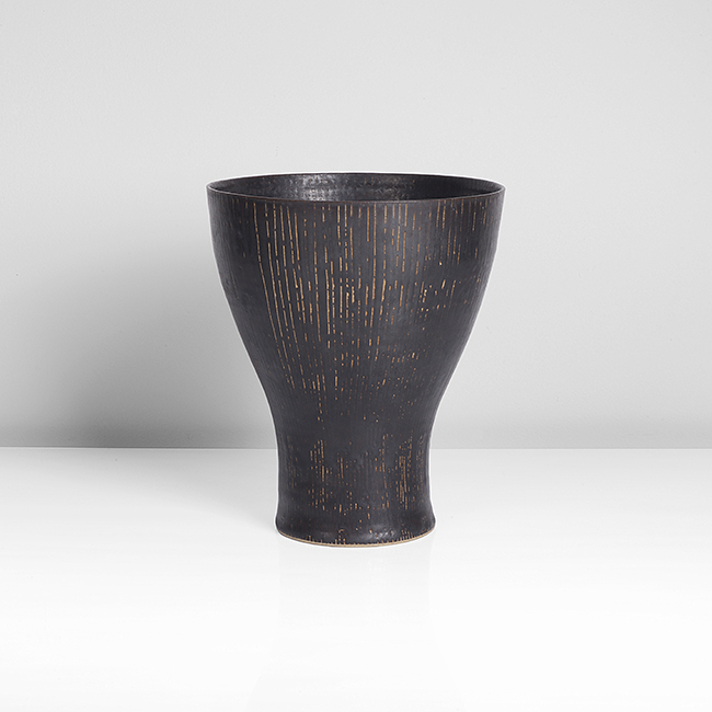 A manganese stoneware vase made by Lucie Rie in circa 1954 sold at auction by Maak Contemporary Ceramics