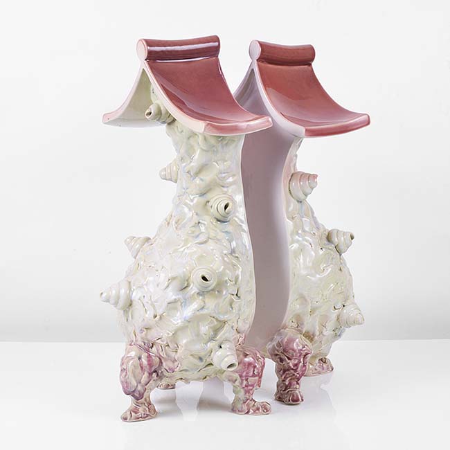 A pink and white earthenware 'Pair' made by Richard Slee in 1998 sold at auction by Maak Contemporary Ceramics