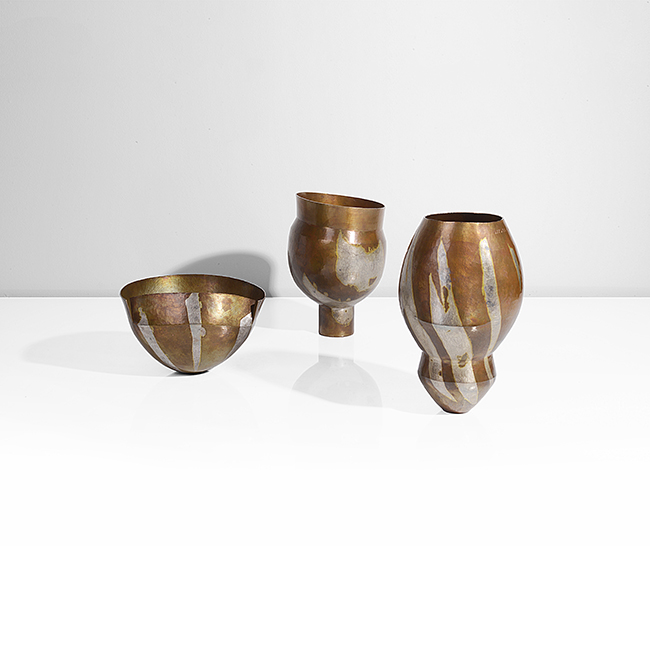 Three copper and white metal asymmetric vessels made by Pete Stevens in 2005