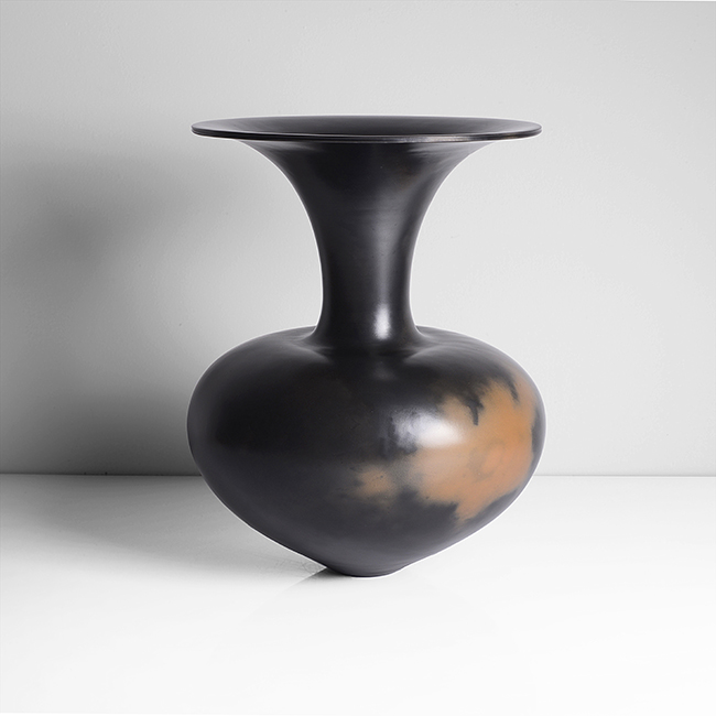 A black earthenware vessel made by Magdalene Odundo in 1989 sold at auction by Maak Contemporary Ceramics