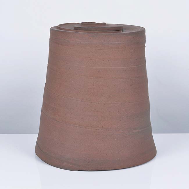 A red stoneware 'Funerary Jar' made by Julian Stair in 1999 sold at auction by Maak Contemporary Ceramics
