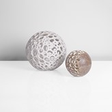Two stoneware pierced sculptural forms made by Mary Rogers in circa 1974 sold at auction by Maak Contemporary Ceramics
