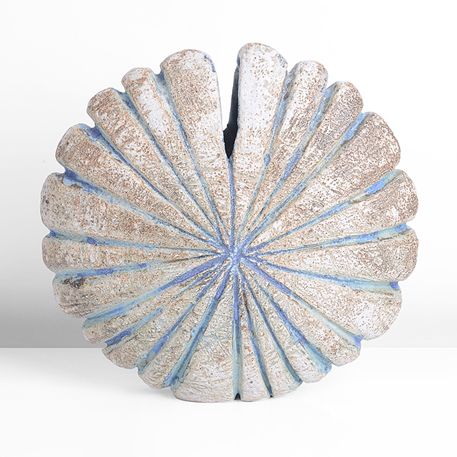 A mottled ochre and blue stoneware sunburst vessel made by Alan Wallwork sold at auction by Maak Contemporary Ceramics
